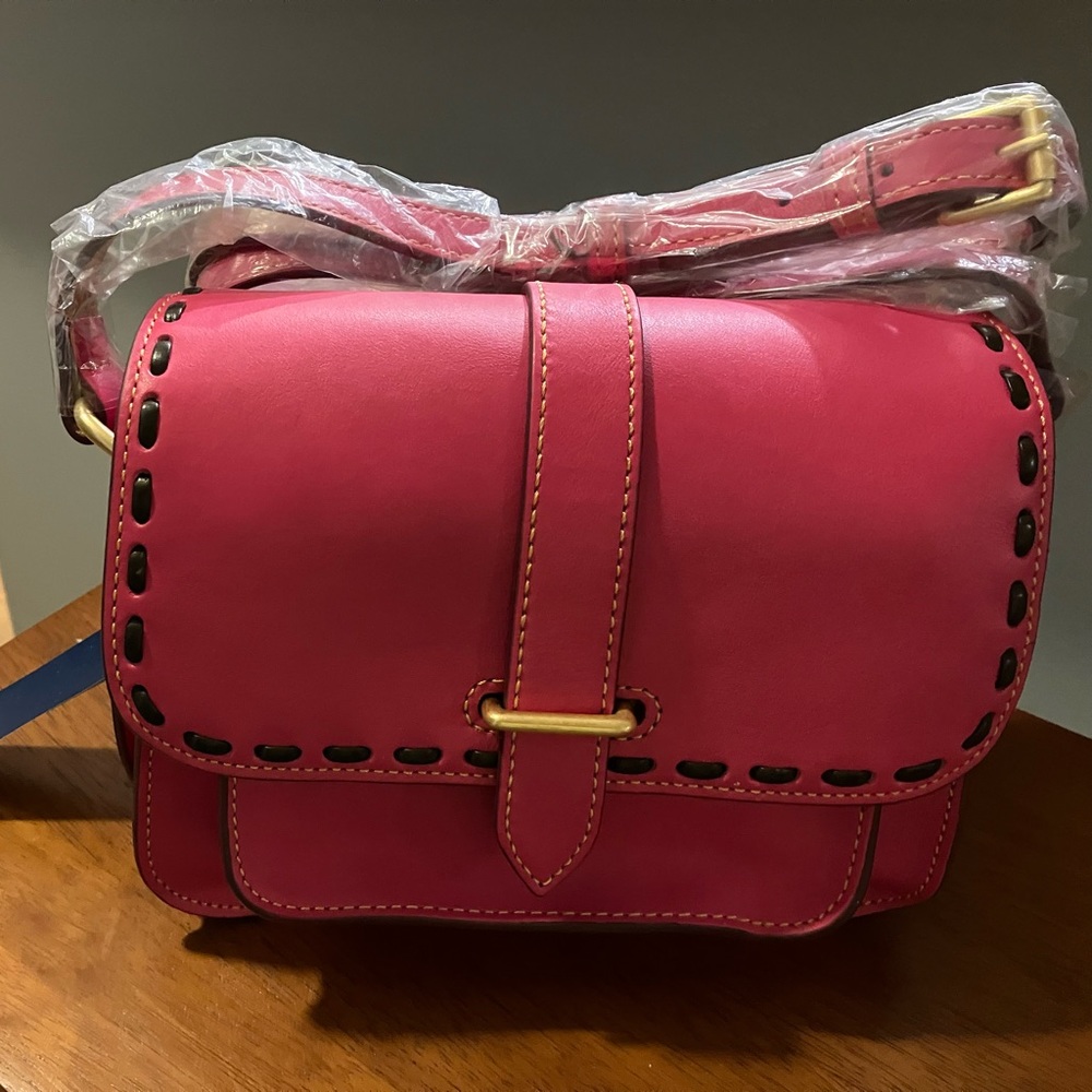 Dooney & Bourke pink leather cross body. Brand New.